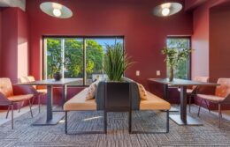 lobby with long couches and big windows