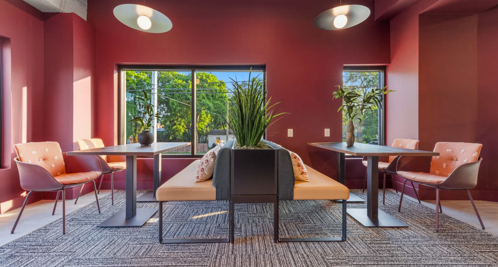 lobby with long couches and big windows