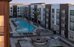 Sunset aerial view of pool and fire pit
