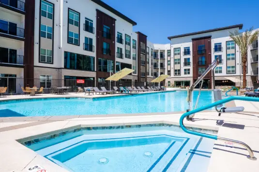 View of the pool and the from the hot tub