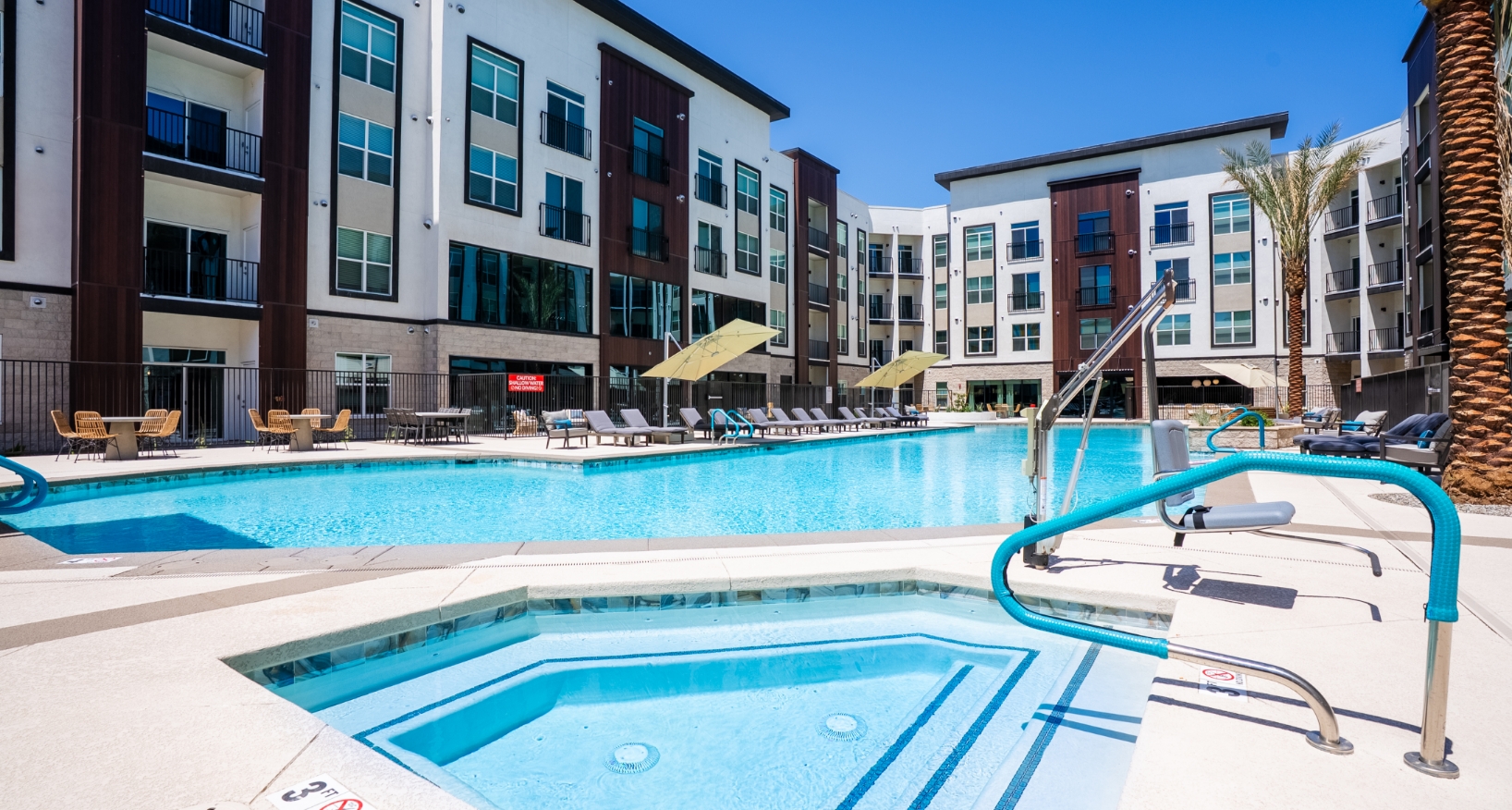 View of the pool and the from the hot tub